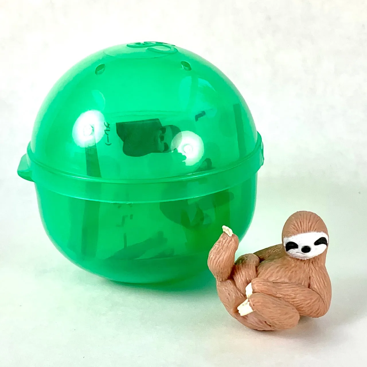 70858 SLOTH CAPSULE-10